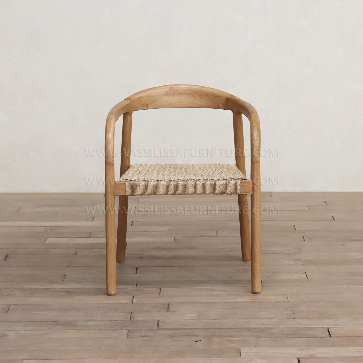 Piers Armchair solid teak wood dining chair with hand-woven seagrass seat and curved barrel back, handcrafted in Jepara Indonesia for boutique hospitality and interior projects