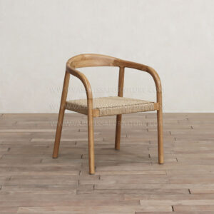 Piers Armchair solid teak wood dining chair with hand-woven seagrass seat and curved barrel back, handcrafted in Jepara Indonesia for boutique hospitality and interior projects