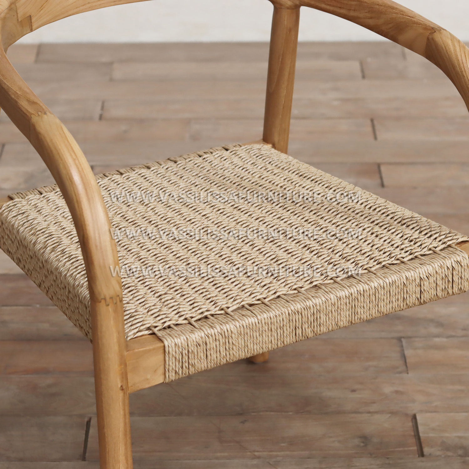 Piers Armchair solid teak wood dining chair with hand-woven seagrass seat and curved barrel back, handcrafted in Jepara Indonesia for boutique hospitality and interior projects